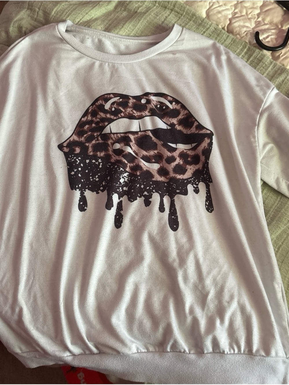 White Women’s Crewneck Sweater with Leopard Drip Lips Graphic